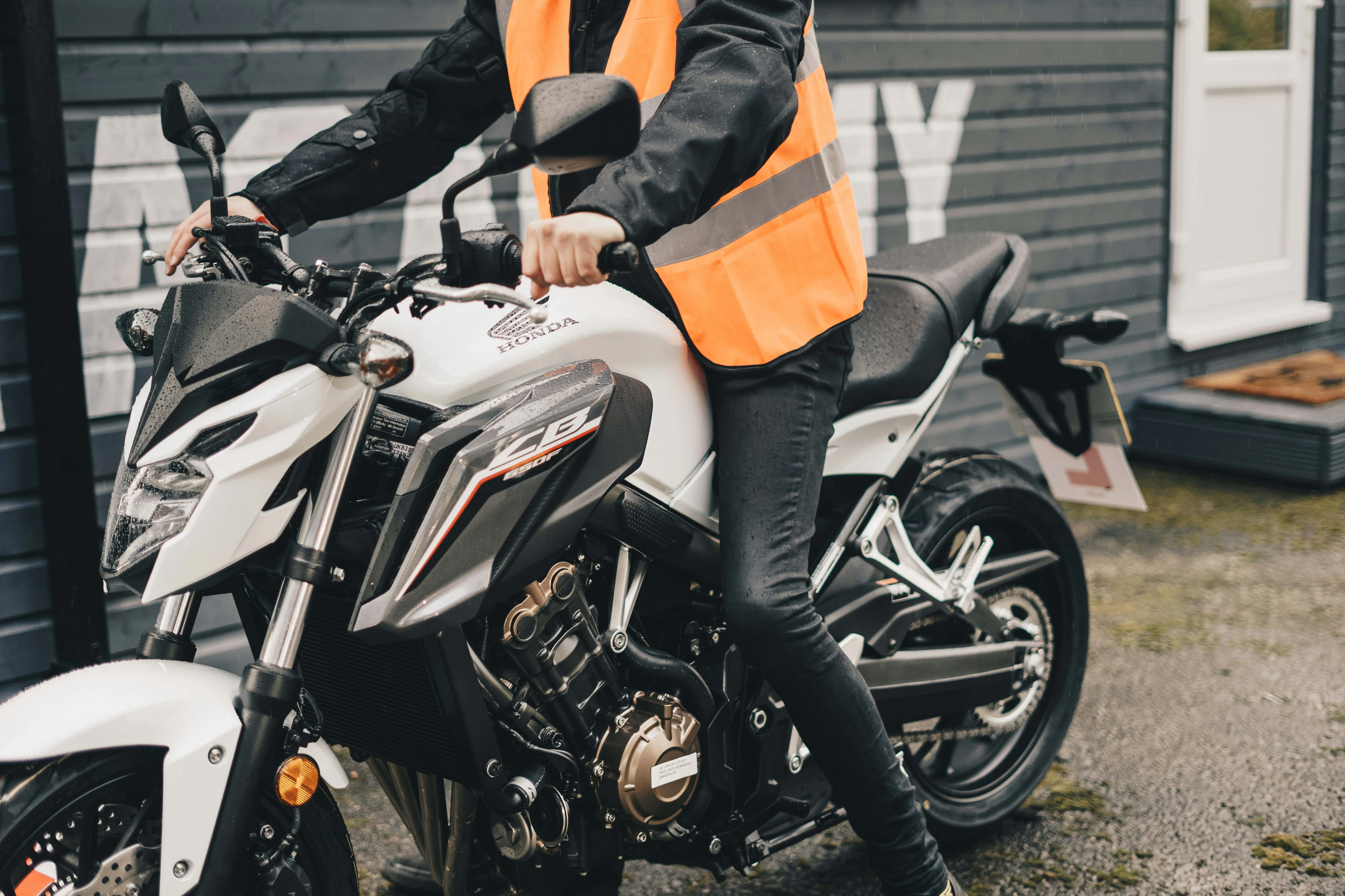 Learner motorcyclist practising during a motorcycle training session in the UK
