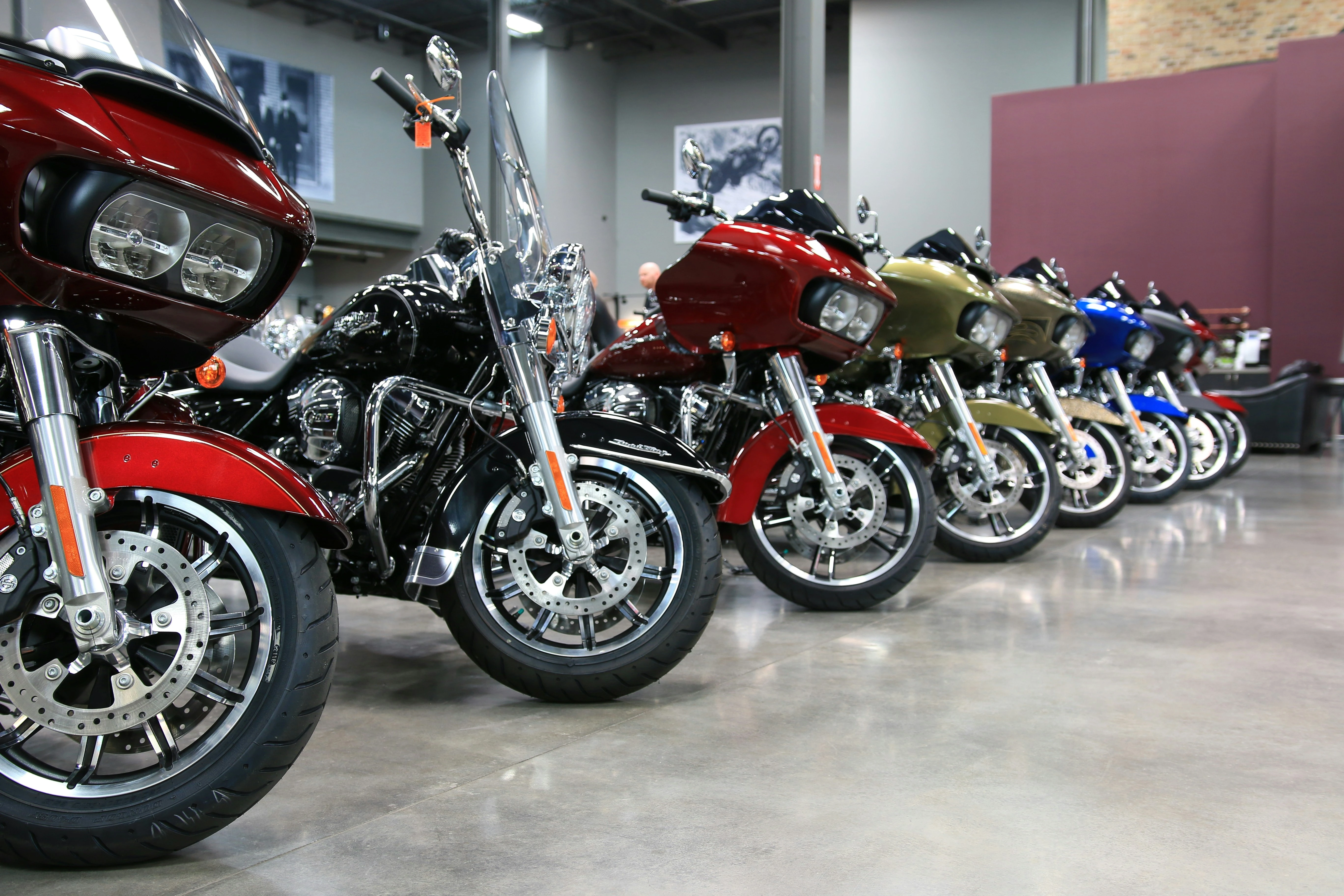 A row of motorcycles parked alongside each other